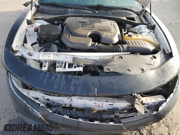 2015 Dodge Charger SE with VIN 2C3CDXBG2FH795792, listed as a Copart auction lot 51297775 with 115,690 mi miles and Salvage Title. Bid and sale history available at DreamBid. Image 11.