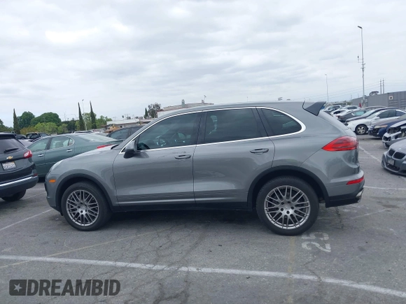 2016 Porsche Cayenne with VIN WP1AA2A27GKA15797, listed as a IAAI auction lot 42063043 with 81,464 mi miles. Bid and sale history available at carsss.com. Image 14.