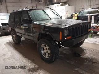 1998 Jeep Cherokee Sport z VIN 1J4FJ68S2WL142027, wystawiony jako IAAI lot #42305669 z przebiegiem 249 580 mil mil oraz . Historia ofert i sprzedaży dostępna na DreamBid. Obrazek 1.