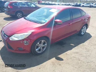 2013 Ford Focus SE with VIN 1FADP3F2XDL371376, listed as a IAAI auction lot 42074806 with 152,836 mi miles. Bid and sale history available at carsss.com. Image 2.