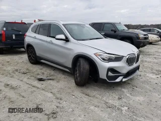 2020 BMW X1 xDrive28i with VIN WBXJG9C05L5P76067, listed as a Copart auction lot 40635893 with 57,184 mi miles. Bid and sale history available at carsss.com. Image 4.