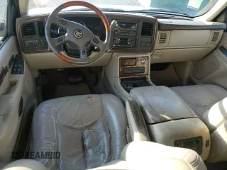 2004 Cadillac Escalade with VIN 1GYEC63T94R208993, listed as a Copart auction lot 87224664 with 285,642 mi miles and Salvage title. Bid and sale history available at DreamBid. Image 8.
