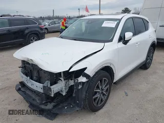 2018 Mazda CX-5 Touring z VIN JM3KFBCM6J0323107, wystawiony jako IAAI lot #41895519 z przebiegiem 86 124 mil mil oraz . Historia ofert i sprzedaży dostępna na DreamBid. Obrazek 20.