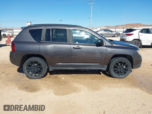 2014 Jeep Compass Sport with VIN 1C4NJCBA4ED880940, listed as a IAAI auction lot 41712357 with 156,171 mi miles. Bid and sale history available at carsss.com. Image 13.