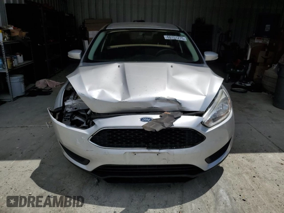 2017 Ford Focus SE with VIN 1FADP3F21HL258115, listed as a Copart auction lot 60151275 with 42,450 mi miles and Salvage title. Bid and sale history available at DreamBid. Image 5.
