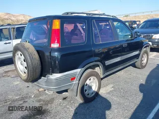 1999 Honda CR-V LX with VIN JHLRD284XXC018161, listed as a IAAI auction lot 41421514 with 209,066 mi miles. Bid and sale history available at carsss.com. Image 4.