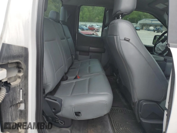 2021 Ford F-150 XL with VIN 1FTFX1E51MFC05216, listed as a Copart auction lot 56571785 with 94,584 mi miles and Salvage title. Bid and sale history available at DreamBid. Image 10.