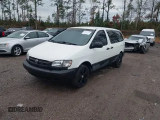 2000 Toyota Sienna CE z VIN 4T3ZF19C4YU209032, wystawiony jako IAAI lot #41067172 z przebiegiem 242 380 mil mil oraz . Historia ofert i sprzedaży dostępna na DreamBid. Obrazek 2.