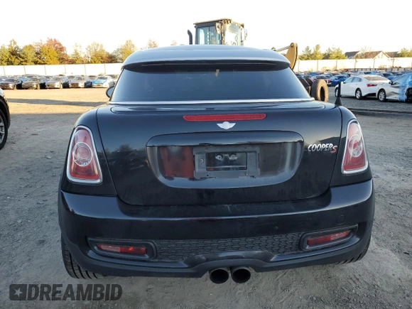 2013 MINI Coupe S z VIN WMWSX3C53DT466665, wystawiony jako Copart lot #79497824 z przebiegiem 94 767 mil mil oraz Szkoda całkowita • Salvage title. Historia ofert i sprzedaży dostępna na DreamBid. Obrazek 6.