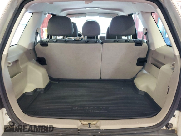 2011 Ford Escape XLS z VIN 1FMCU9C71BKB04384, wystawiony jako IAAI lot #42790150 z przebiegiem 103 089 mil mil oraz . Historia ofert i sprzedaży dostępna na DreamBid. Obrazek 13.