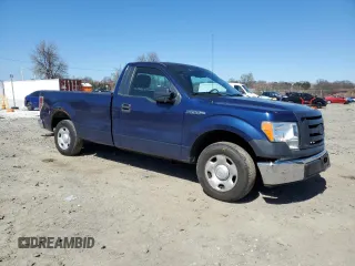 2009 Ford F-150 XL with VIN 1FTRF12809KA17106, listed as a Copart auction lot 50728765 with 133,491 mi miles and Salvage title. Bid and sale history available at DreamBid. Image 4.