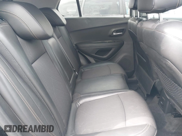 2020 Chevrolet Trax LT with VIN 3GNCJLSB8LL221077, listed as a IAAI auction lot 42421378 with 97,372 mi miles and . Bid and sale history available at DreamBid. Image 8.