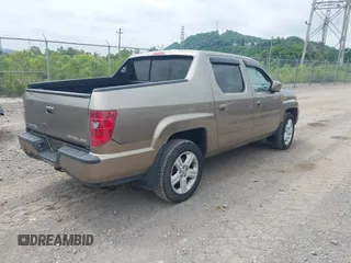 2009 Honda Ridgeline RTL with VIN 5FPYK16579B104545, listed as a IAAI auction lot 42601283 with 100,543 mi miles and . Bid and sale history available at DreamBid. Image 4.