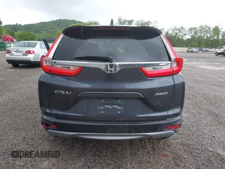 2018 Honda CR-V EX z VIN 7FARW2H50JE094132, wystawiony jako IAAI lot #42337889 z przebiegiem 59 273 mil mil oraz . Historia ofert i sprzedaży dostępna na DreamBid. Obrazek 17.