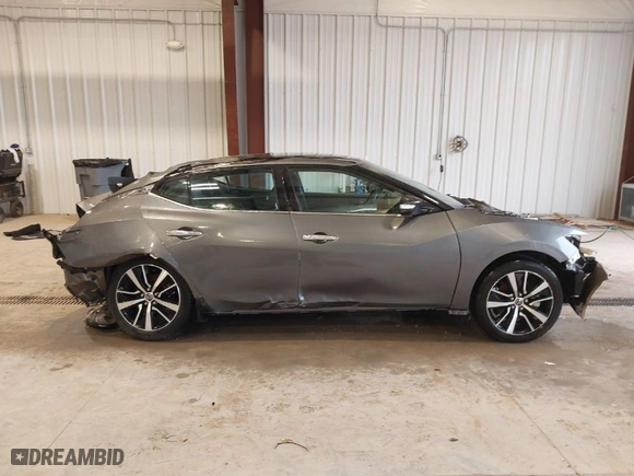 2021 Nissan Maxima SV with VIN 1N4AA6CV9MC513527, listed as a IAAI auction lot 40056232 with 54,583 mi miles. Bid and sale history available at carsss.com. Image 14.