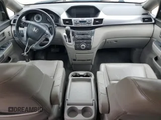 2012 Honda Odyssey Touring with VIN 5FNRL5H90CB050580, listed as a Copart auction lot 58502925 with 226,929 mi miles and Salvage title. Bid and sale history available at DreamBid. Image 8.