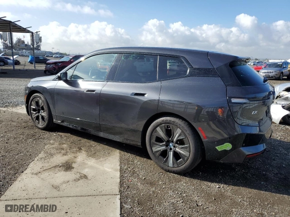 2023 BMW iX xDrive50 with VIN WB523CF02PCM92379, listed as a Copart auction lot 47726814 with 7,721 mi miles. Bid and sale history available at carsss.com. Image 2.