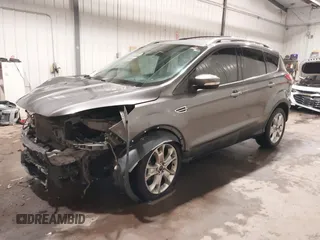 2014 Ford Escape Titanium with VIN 1FMCU9JX9EUA56421, listed as a IAAI auction lot 41392372 with 117,234 mi miles. Bid and sale history available at carsss.com. Image 19.