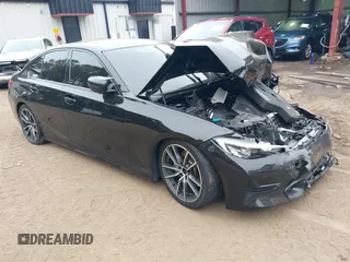 2019 BMW 3 Series 330i xDrive with VIN WBA5R7C52KAJ87697, listed as a IAAI auction lot 41795207 with 53,760 mi miles. Bid and sale history available at carsss.com. Image 1.