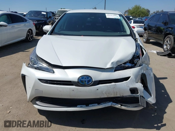 2021 Toyota Prius L Eco with VIN JTDKAMFU8M3135142, listed as a IAAI auction lot 42317007 with 77,353 mi miles and . Bid and sale history available at DreamBid. Image 12.