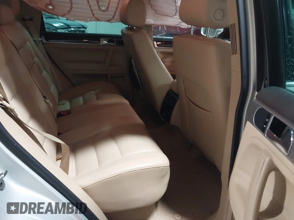 2010 Volkswagen Touareg VR6 with VIN WVGBF7A93AD004398, listed as a IAAI auction lot 41470257 with 108,181 mi miles and . Bid and sale history available at DreamBid. Image 8.