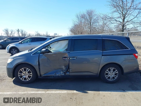 2011 Honda Odyssey EX-L with VIN 5FNRL5H60BB103430, listed as a IAAI auction lot 41752581 with 108,422 mi miles and . Bid and sale history available at carsss.com. Image 14.