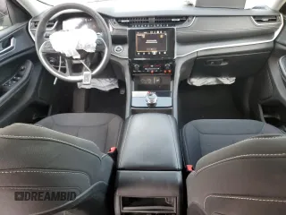 2023 Jeep Grand Cherokee Laredo with VIN 1C4RJHAG0PC674527, listed as a Copart auction lot 58538195 with 37,434 mi miles and Salvage title. Bid and sale history available at DreamBid. Image 8.