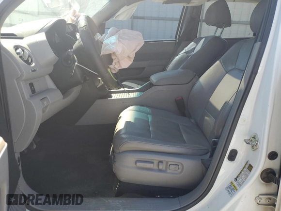 2014 Honda Pilot EX-L with VIN 5FNYF3H74EB009619, listed as a Copart auction lot 52297465 with 193,923 mi miles and Salvage Title. Bid and sale history available at DreamBid. Image 7.