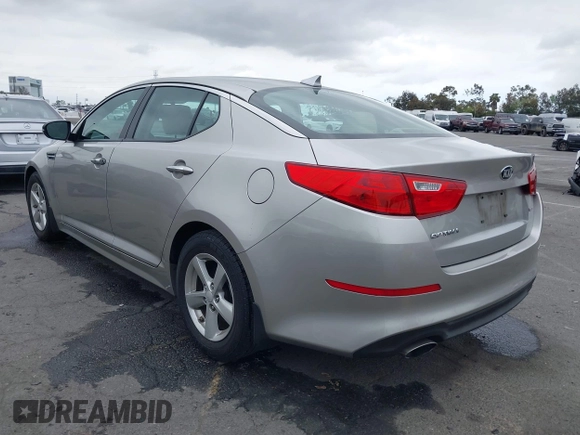 2015 Kia Optima LX with VIN KNAGM4A78F5584534, listed as a IAAI auction lot 42182927 with 63,225 mi miles and . Bid and sale history available at carsss.com. Image 3.