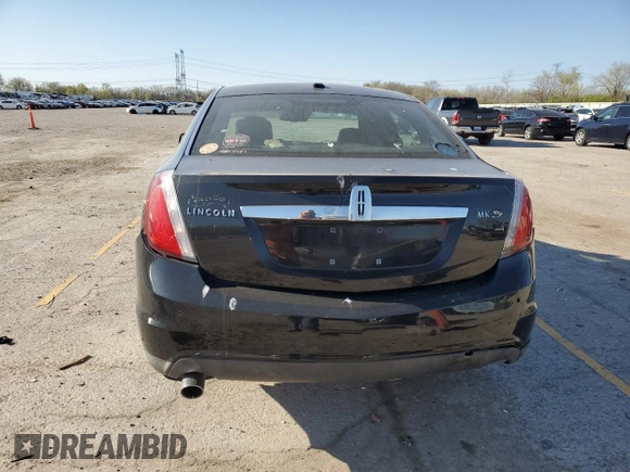 2011 Lincoln MKS z VIN 1LNHL9DR1BG607036, wystawiony jako Copart lot #53512305 z przebiegiem 159 921 mil mil oraz Szkoda całkowita • Salvage title. Historia ofert i sprzedaży dostępna na DreamBid. Obrazek 6.