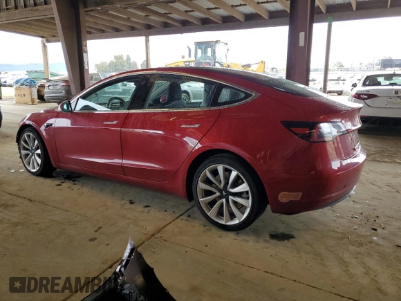 2018 Tesla Model 3 Long Range Battery z VIN 5YJ3E1EB3JF091637, wystawiony jako Copart lot #52127795 z przebiegiem 69 145 mil mil oraz Szkoda całkowita • Salvage title. Historia ofert i sprzedaży dostępna na DreamBid. Obrazek 2.