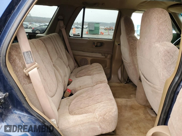 1999 GMC Jimmy SLE z VIN 1GKDT13W8X2545509, wystawiony jako Copart lot #81608944 z przebiegiem 130 881 mil mil oraz Szkoda całkowita • Salvage title. Historia ofert i sprzedaży dostępna na DreamBid. Obrazek 11.