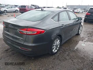 2019 Ford Fusion Hybrid SE with VIN 3FA6P0LU3KR108898, listed as a IAAI auction lot 41882847 with 159,076 mi miles. Bid and sale history available at carsss.com. Image 4.
