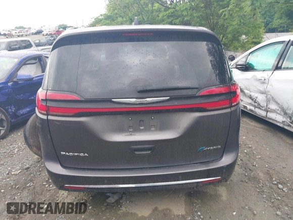 2023 Chrysler Pacifica Hybrid Touring L with VIN 2C4RC1L72PR540902, listed as a IAAI auction lot 42151047 with Not Provided miles and . Bid and sale history available at DreamBid. Image 15.