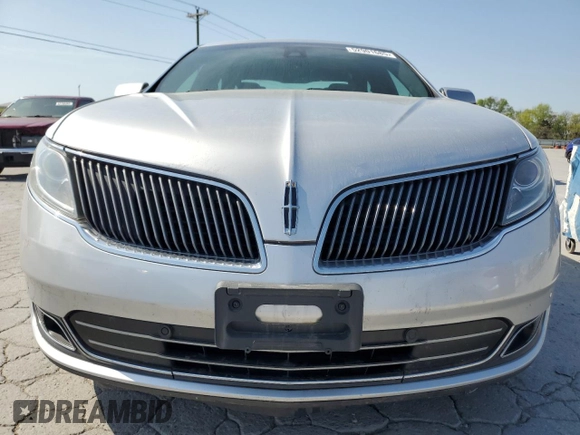 2013 Lincoln MKS with VIN 1LNHL9EK0DG612314, listed as a Copart auction lot 52901685 with 124,828 mi miles and Salvage title. Bid and sale history available at DreamBid. Image 5.