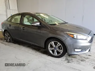 2017 Ford Focus SE with VIN 1FADP3FE2HL346276, listed as a Copart auction lot 43392285 with 120,403 mi miles and Clean Title. Bid and sale history available at carsss.com. Image 4.