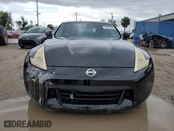 2009 Nissan 370Z Touring with VIN JN1AZ44E29M406023, listed as a Copart auction lot 73721324 with 108,072 mi miles and Salvage Title. Bid and sale history available at carsss.com. Image 5.