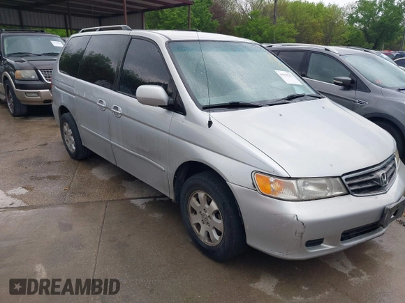 2004 Honda Odyssey EX with VIN 5FNRL18694B076305, listed as a IAAI auction lot 41929212 with 287,717 mi miles and . Bid and sale history available at DreamBid. Image 1.