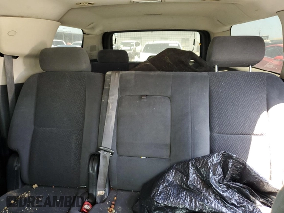 2007 Chevrolet Suburban LS z VIN 1GNFC160X7J180517, wystawiony jako Copart lot #63933475 z przebiegiem Nie podano mil oraz Czysty tytuł • Clean title. Historia ofert i sprzedaży dostępna na DreamBid. Obrazek 10.