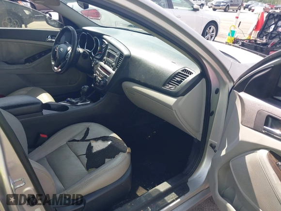 2013 Kia Optima EX with VIN 5XXGN4A75DG092276, listed as a IAAI auction lot 42306138 with 201,649 mi miles and . Bid and sale history available at DreamBid. Image 5.