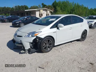 2013 Toyota Prius One z VIN JTDKN3DU6D0343264, wystawiony jako IAAI lot #42170569 z przebiegiem 124 533 mil mil oraz . Historia ofert i sprzedaży dostępna na DreamBid. Obrazek 2.