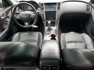 2014 Infiniti Q50 Premium with VIN JN1BV7AP8EM684524, listed as a Copart auction lot 59286115 with 105,107 mi miles and Salvage title. Bid and sale history available at DreamBid. Image 8.