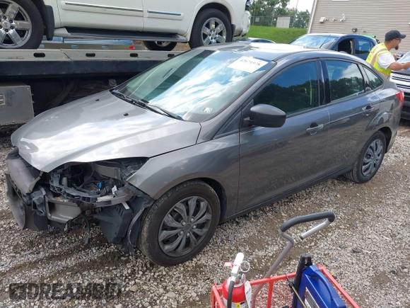 2012 Ford Focus SE with VIN 1FAHP3F29CL310052, listed as a IAAI auction lot 42671578 with 220,537 mi miles and . Bid and sale history available at DreamBid. Image 2.