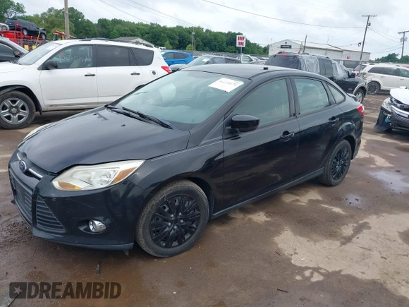 2012 Ford Focus SE with VIN 1FAHP3F22CL249739, listed as a IAAI auction lot 42538870 with 171,975 mi miles and . Bid and sale history available at DreamBid. Image 2.