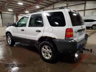 2006 Ford Escape XLT with VIN 1FMYU03Z76KC14011, listed as a Copart auction lot 79539204 with 239,785 mi miles and Clean Title. Bid and sale history available at carsss.com. Image 2.