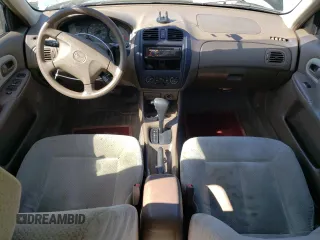 1999 Mazda Protege DX with VIN JM1BJ2223X0139775, listed as a Copart auction lot 54338455 with 63,198 mi miles and Salvage Title. Bid and sale history available at DreamBid. Image 8.