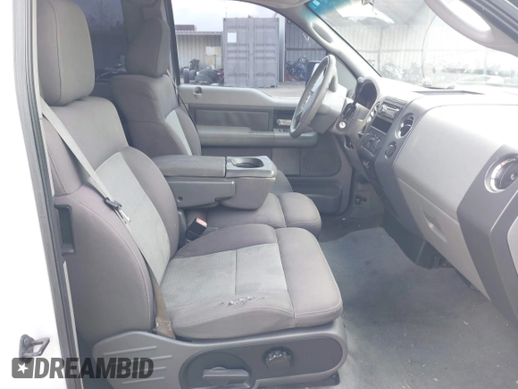 2004 Ford F-150 XLT with VIN 1FTRX12594KD71332, listed as a IAAI auction lot 42138488 with 170,234 mi miles. Bid and sale history available at carsss.com. Image 5.