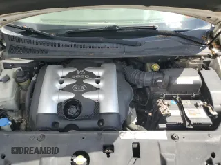 2006 Kia Sedona LX with VIN KNDMB233366052094, listed as a Copart auction lot 58241074 with 181,295 mi miles and Salvage Title. Bid and sale history available at carsss.com. Image 12.