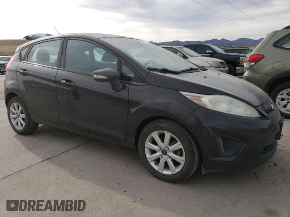 2013 Ford Fiesta SE with VIN 3FADP4EJ8DM123351, listed as a Copart auction lot 48462125 with 90,955 mi miles and Clean Title. Bid and sale history available at carsss.com. Image 4.