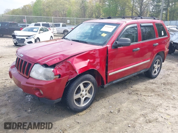 2005 Jeep Grand Cherokee Laredo with VIN 1J4HS48N95C711992, listed as a IAAI auction lot 41944696 with 209,299 mi miles and . Bid and sale history available at DreamBid. Image 17.
